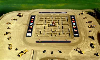 Giant Pac-Man maze created with Caterpillar construction equipment
