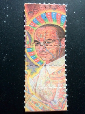 A tenstrip of "Alex Grey" Hofmann LSD blotters, dosed at 100-120 µg each.