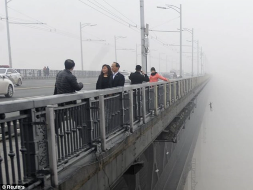 China woman suicide leap