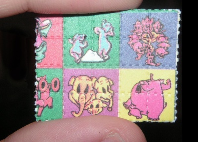 Pink Elephants on Parade printed on LSD Blotter paper