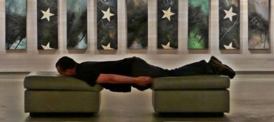 Planking at an art gallery opening