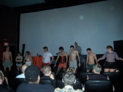 Rocky Horror Picture Show participants acting out scene