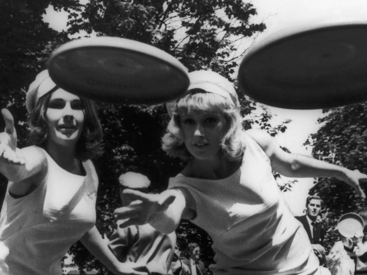 Girls throwing a Frisbee disc - Wham-O commercial frame