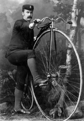 Man on Penny Farthing bicycle 2