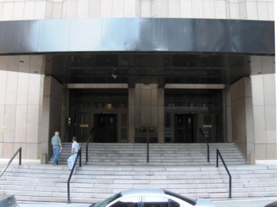 Street level view of 33 Thomas Street entrance showing elevated foyer