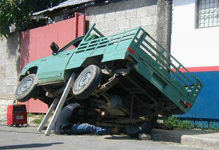 Wooden boards used to hold car tipped on side