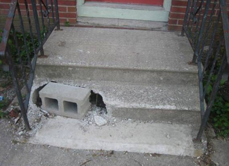 Concret block plugs hole in broken steps