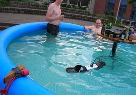Flip flop shoes used to float electrical power outlet