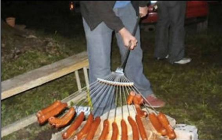 Garden rake used to roast dozen weenies at a time