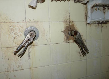 Pipe wrenches replacing shower faucet handles