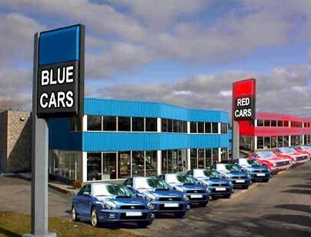 Car lot with nothing but red and blue cars