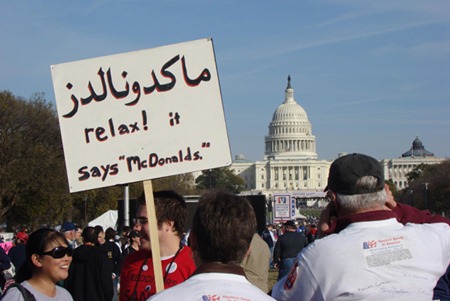 Middle Eastern mumbo jumbo protest sign (it says McDonalds)