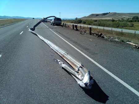 Car shaves guardrail right off Car shaves guardrail right off