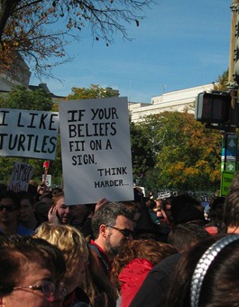If your beliefs fit on a sign then think harder protest sign
