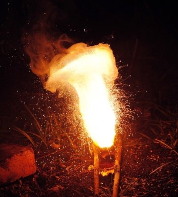 An aluminothermic reaction with Iron(III) oxide; as known as a thermite reaction
