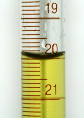 A meniscus as seen in a burette full of colored water