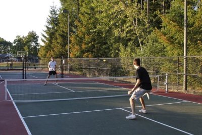 Pickleballers playing pickle ball