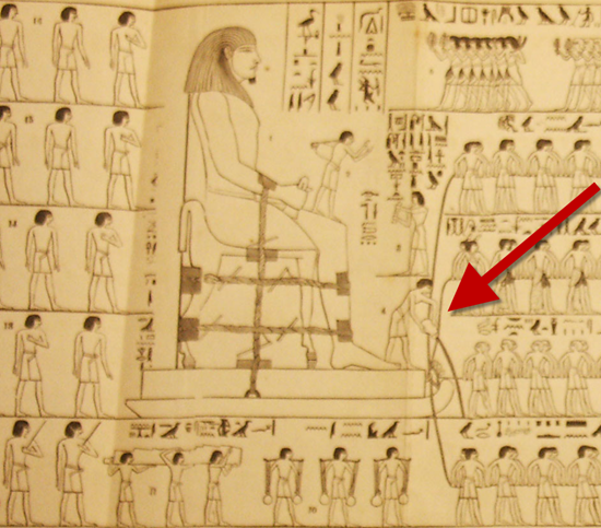 This Egyptian drawing shows slaves pulling a huge statue while another man pours water in front of the sled