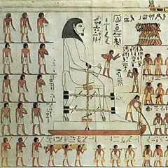 Ancient Egyptian drawing showing how a huge statue is moved