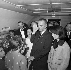 Vice President Lyndon B. Johnson is sworn in as President after the assassination of John F. Kennedy