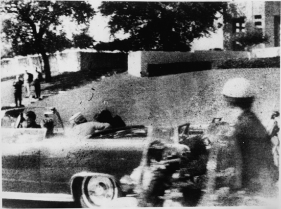 The assassination of John F. Kennedy - grassy knoll in background