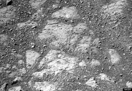 NASA photo showing flat bedrock before the appearance of the mystery rock