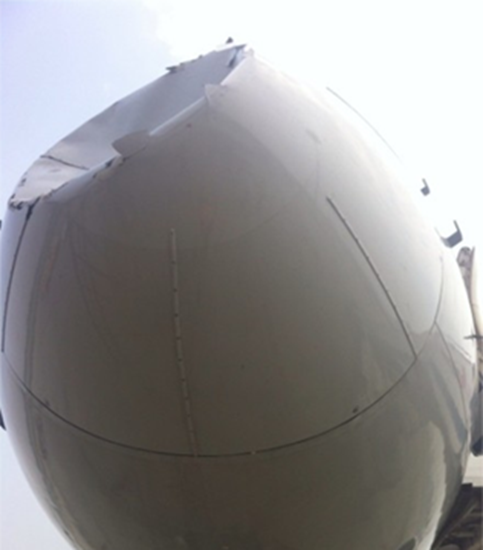 Close-up of damage to nose cone of chinese boeing 757 after collision with ufo Close-up of damage to nose cone of Chinese Boeing 757 after collision with UFO