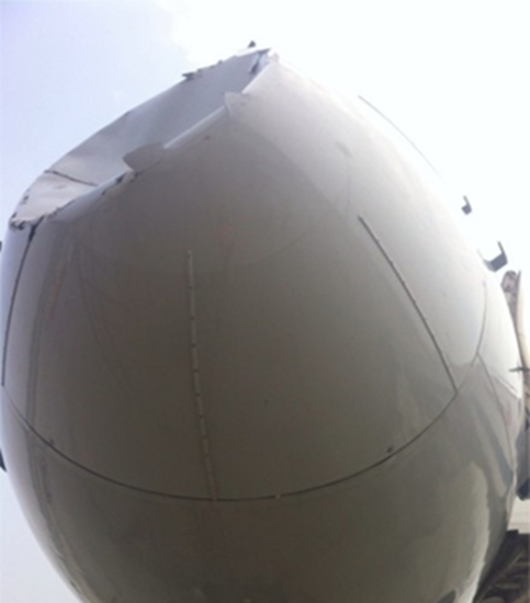 Close-up of damage to nose cone of Chinese Boeing 757 after collision with UFO