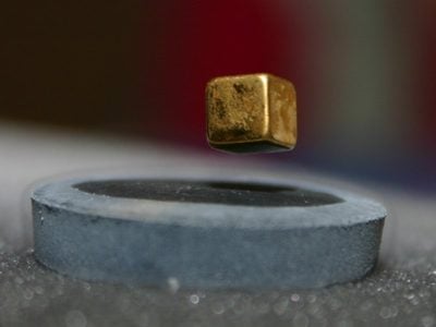A magnet is suspended over a liquid nitrogen cooled high-temperature superconductor