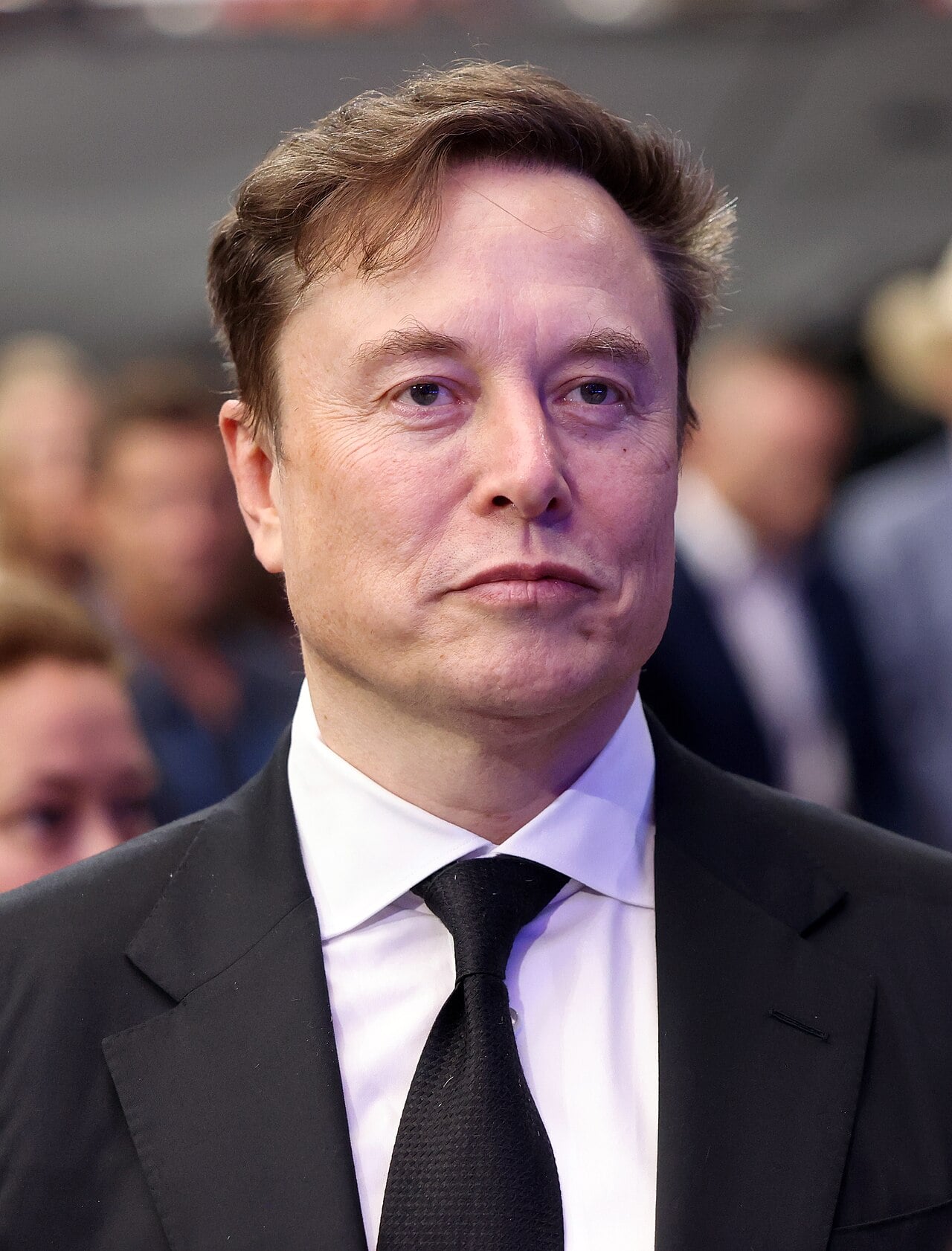 Elon musk slams memory pricing as ai demand sends micron profits soaring 1 Elon Musk at the Memorial for Charlie Kirk at State Farm Stadium in Glendale, Arizona